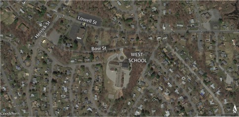 This figure is an aerial photo showing the West Memorial Elementary School and its nearby neighborhood.